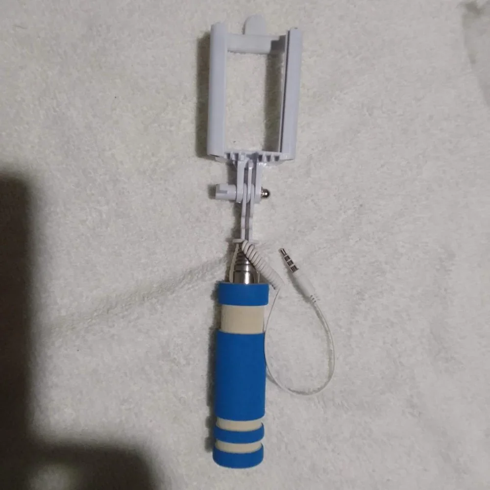 Protis wireless mini cable selfie sticks for remote photo-taking, brand new